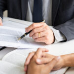 business people and lawyers discussing contract papers sitting at the table. Concepts of law, advice, legal services, legal and judgment concept