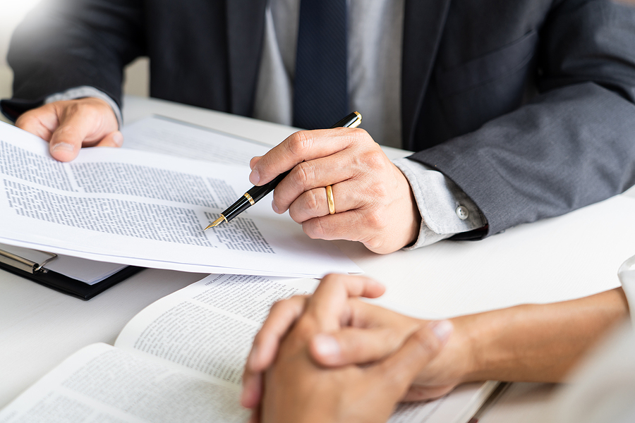 business people and lawyers discussing contract papers sitting at the table. Concepts of law, advice, legal services, legal and judgment concept